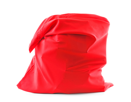 Santa Claus bag full of gifts on white backgroundの写真素材