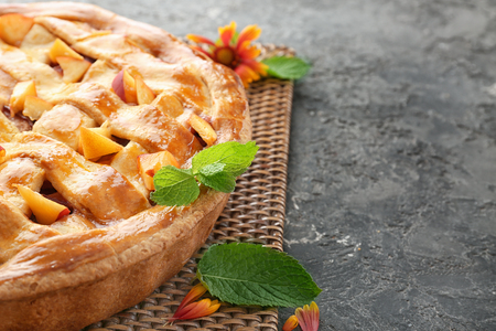 Tasty homemade peach pie on table, closeupの写真素材