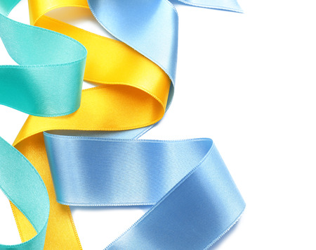 Colorful satin ribbons on white backgroundの写真素材