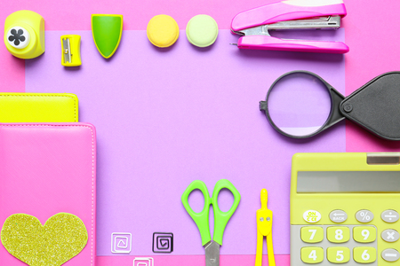 Set of school stationery with calculator on color backgroundの写真素材
