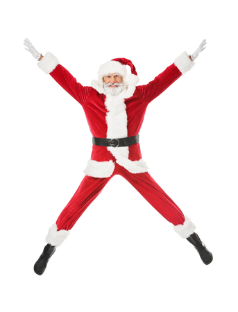 Jumping Santa Claus on white backgroundの写真素材