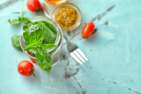Delicious vegetable salad in mason jar on light tableの写真素材