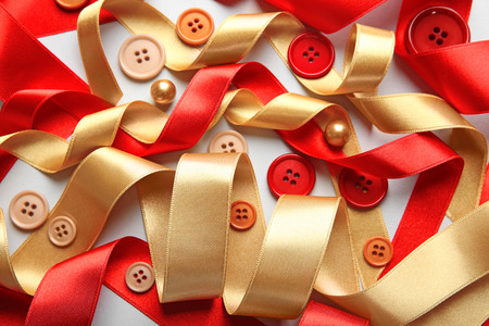 Different ribbons with buttons on white backgroundの写真素材