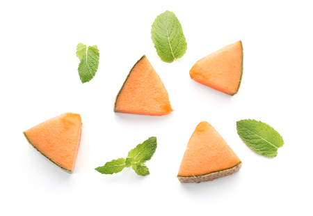 Pieces of tasty cut melon on white backgroundの写真素材