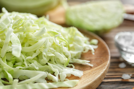 Cut cabbage on plate, closeupの写真素材