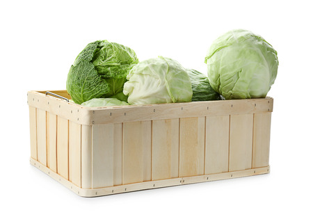 Box with fresh cabbage on white backgroundの写真素材