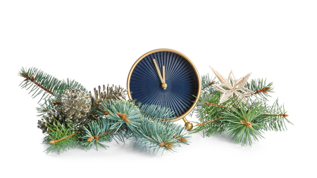 Alarm clock with fir branches and decorations on white background. Christmas countdownの写真素材