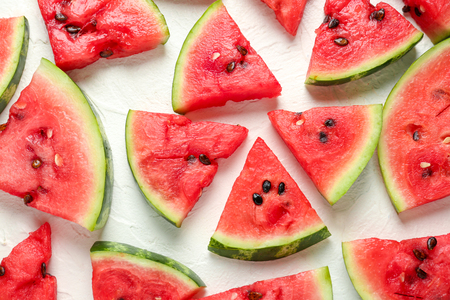 Slices of fresh watermelon on white backgroundの写真素材