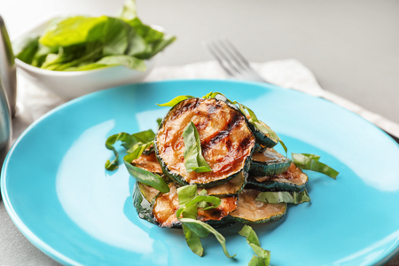 Tasty grilled zucchini on plate, closeupの写真素材