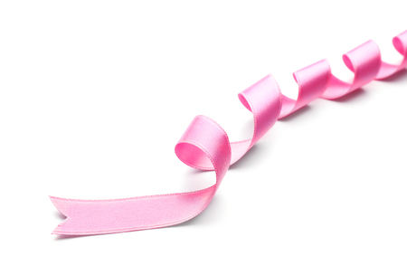 Pink ribbon on white backgroundの写真素材