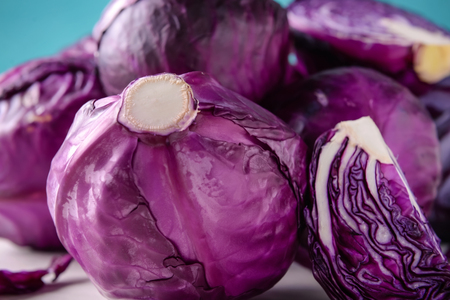 Ripe red cabbages on table, closeupの写真素材