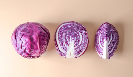 Cut red cabbage on color backgroundの写真素材