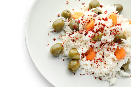 Plate with tasty boiled rice and vegetables on white background, closeupの写真素材