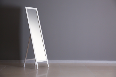 Large mirror near color wallの写真素材