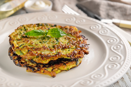 Tasty zucchini pancakes on plate, closeupの写真素材