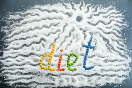 Word DIET made of color candies with sugar on tableの写真素材