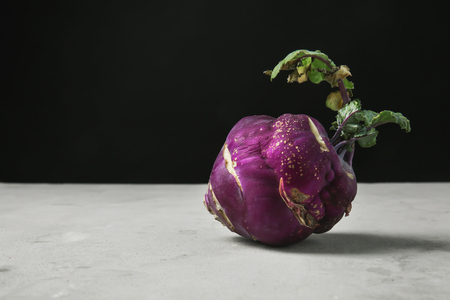 Fresh kohlrabi on grey tableの写真素材