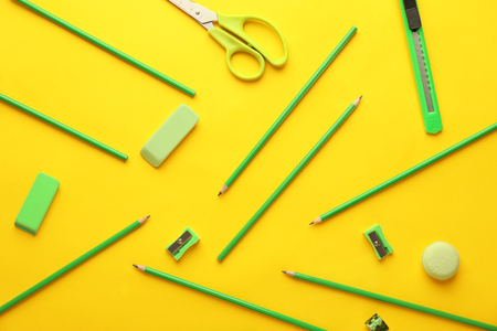 Composition with different school stationery on color backgroundの写真素材