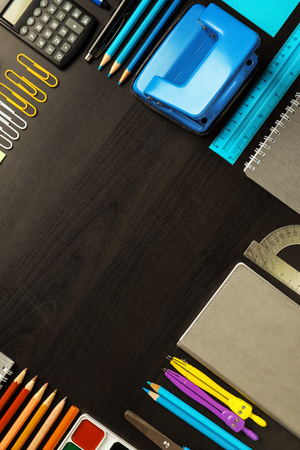 Composition with different school stationery on dark backgroundの写真素材