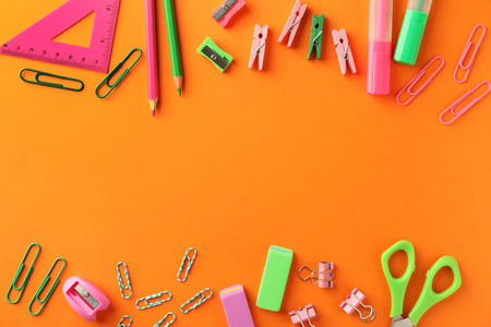 Composition with different school stationery on color backgroundの写真素材