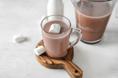 Cup of tasty cocoa and marshmallow on boardの写真素材