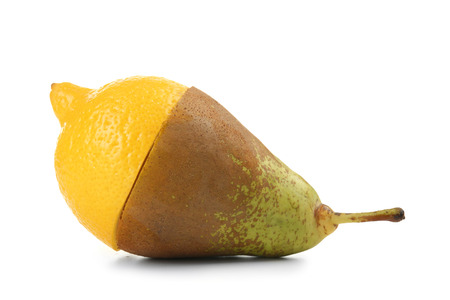 Delicious cut lemon and pear on white backgroundの写真素材