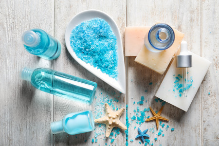 Composition with bath products on light wooden tableの写真素材