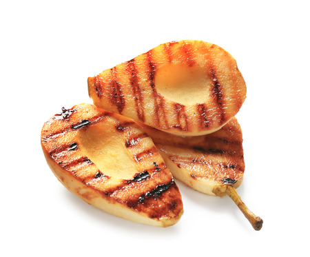 Halves of tasty grilled pears on white backgroundの写真素材