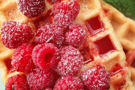 Delicious waffles with jam and raspberries, closeupの写真素材