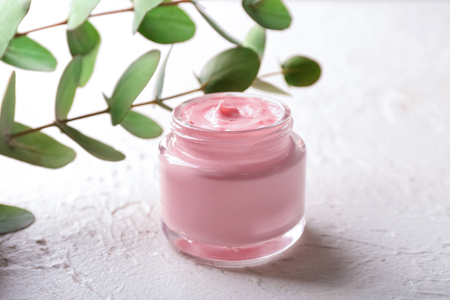 Jar with body cream on white tableの写真素材