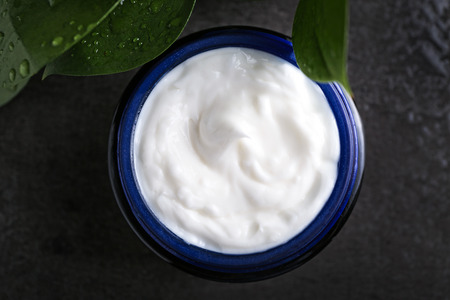 Jar with body cream on table, top viewの写真素材