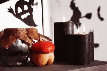 Creative decorations for Halloween party on mantelpieceの写真素材
