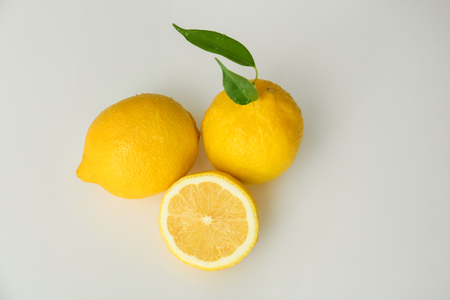 Ripe juicy lemons on white backgroundの写真素材