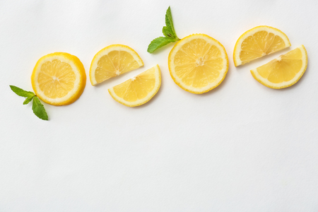 Flat lay composition with lemon slices on white backgroundの写真素材