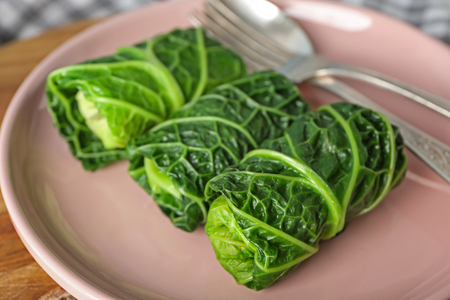 Plate with stuffed cabbage leaves on table, closeupの写真素材