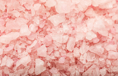 Texture of pink sea salt, closeup