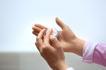 Woman applying body cream, closeupの写真素材