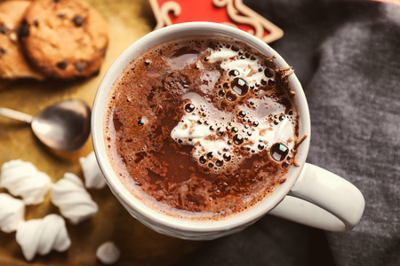 Cup of hot chocolate with marshmallows on trayの写真素材