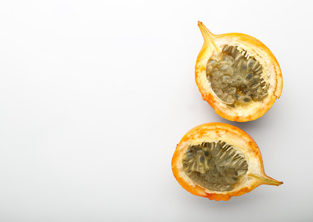 Ripe tropical fruit on white background