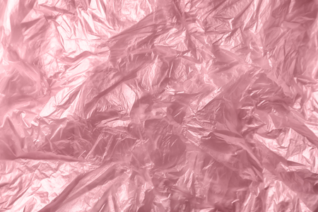 Pink crumpled paper texture, closeupの写真素材