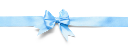 Blue ribbon with bow on white backgroundの写真素材