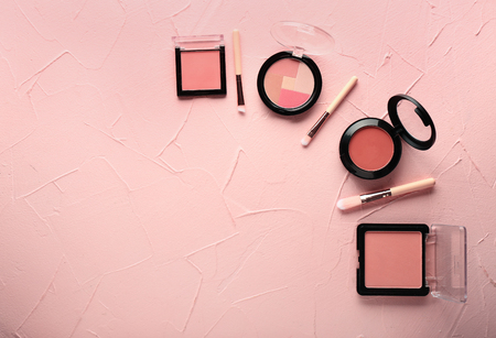 Set of decorative cosmetics on color backgroundの写真素材