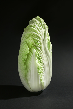 Fresh cabbage on dark background
