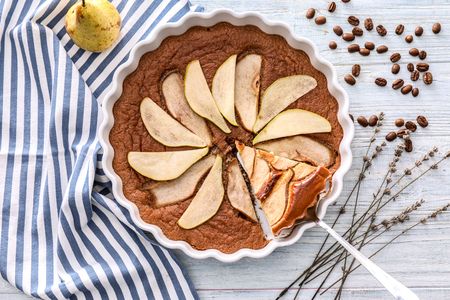 Delicious pear cake on wooden tableの写真素材