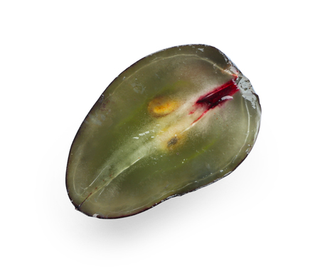 Half of ripe juicy grape on white backgroundの写真素材