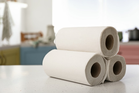 Rolls of paper towels on kitchen tableの写真素材