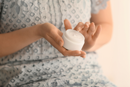 Woman applying body cream, closeupの写真素材