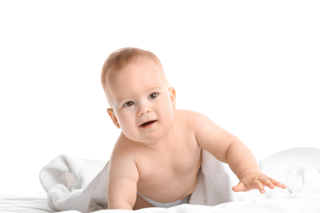 Cute little baby with soft towel on white backgroundの写真素材