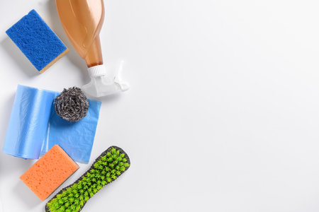 Cleaning supplies on white backgroundの写真素材