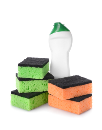 Bottle of detergent with cleaning sponges on white backgroundの写真素材